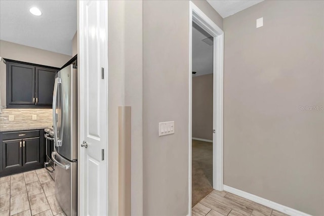 3918 NW 46th Ter, Ocala, FL 34482 - hall featuring light wood finished floors and baseboards