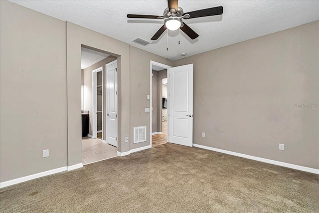3918 NW 46th Ter, Ocala, FL 34482 - unfurnished bedroom with carpet flooring, visible vents, and baseboards