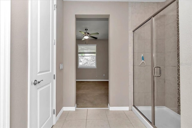 3918 NW 46th Ter, Ocala, FL 34482 - full bath featuring tile patterned flooring, ceiling fan, a shower stall, and baseboards