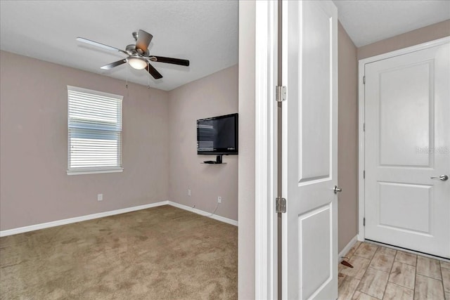 3918 NW 46th Ter, Ocala, FL 34482 - interior space featuring a ceiling fan and baseboards