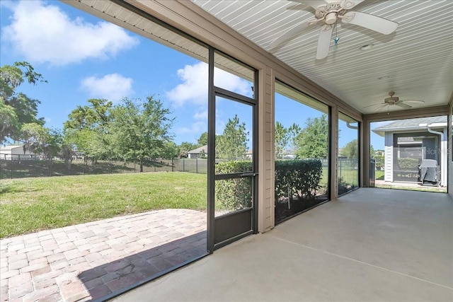 3918 NW 46th Ter, Ocala, FL 34482 - unfurnished sunroom featuring a ceiling fan