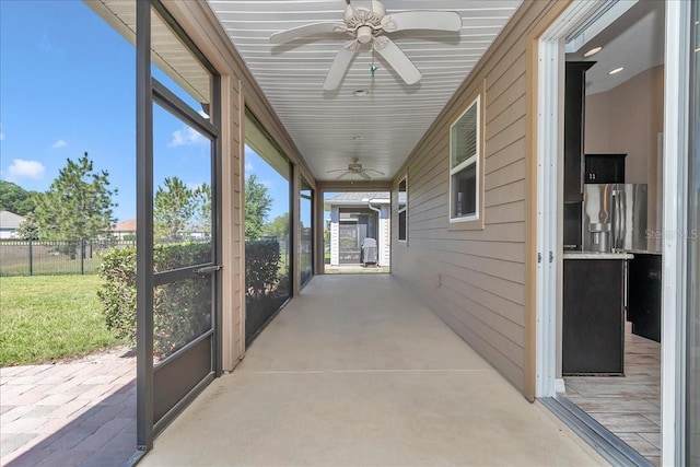 3918 NW 46th Ter, Ocala, FL 34482 - unfurnished sunroom featuring ceiling fan