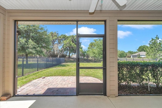 3918 NW 46th Ter, Ocala, FL 34482 - entryway featuring a ceiling fan, a healthy amount of sunlight, and finished concrete floors