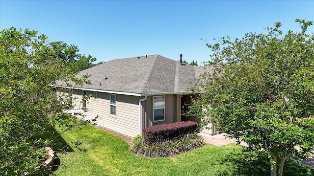 3918 NW 46th Ter, Ocala, FL 34482 - view of home's exterior featuring roof with shingles