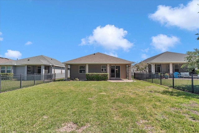 3918 NW 46th Ter, Ocala, FL 34482 - rear view of property featuring stucco siding, a yard, and a fenced backyard