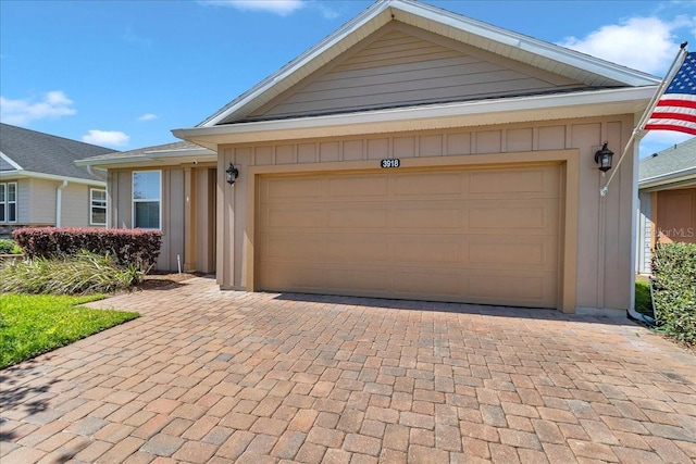 3918 NW 46th Ter, Ocala, FL 34482 - view of front of home with decorative driveway and board and batten siding