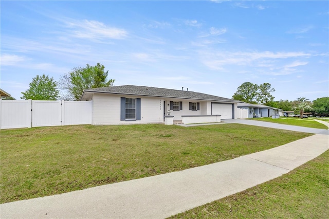 15044 SW 35th Avenue Rd, Ocala, FL 34473 - single story home with concrete driveway, a gate, an attached garage, a front yard, and fence