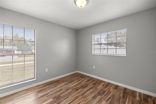 15044 SW 35th Avenue Rd, Ocala, FL 34473 - unfurnished room with wood finished floors and baseboards