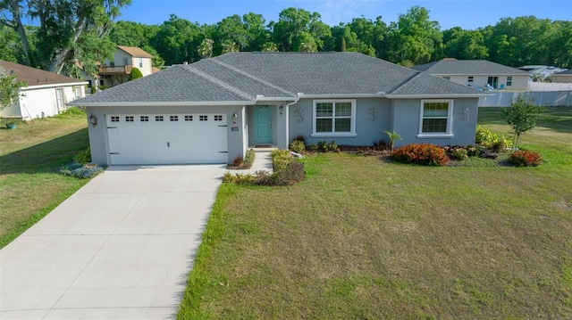 7886 SW 103rd Loop, Ocala, FL 34476 - ranch-style house with stucco siding, a shingled roof, driveway, a front lawn, and an attached garage