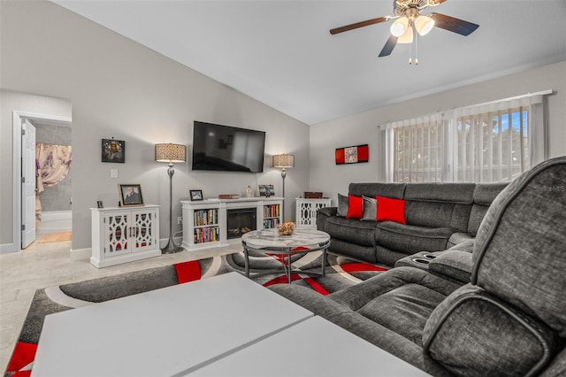 7886 SW 103rd Loop, Ocala, FL 34476 - living room with a ceiling fan, lofted ceiling, and baseboards