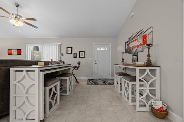 7886 SW 103rd Loop, Ocala, FL 34476 - interior space with a ceiling fan, vaulted ceiling, and baseboards