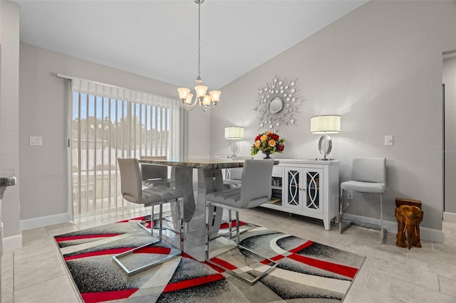 7886 SW 103rd Loop, Ocala, FL 34476 - dining room featuring tile patterned floors, a chandelier, vaulted ceiling, and baseboards