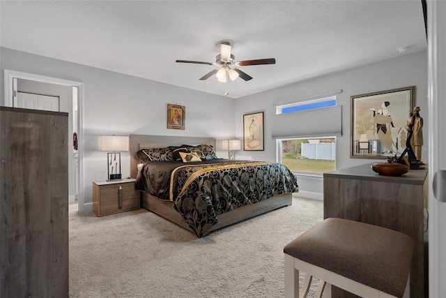 7886 SW 103rd Loop, Ocala, FL 34476 - carpeted bedroom featuring a ceiling fan and baseboards