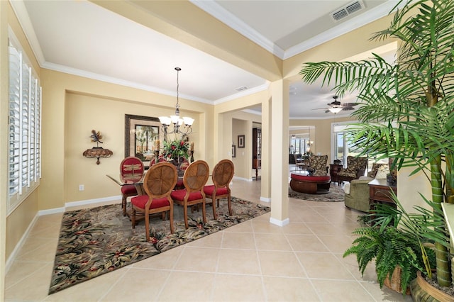 dining space with baseboards, crown molding, tile patterned flooring, and visible vents