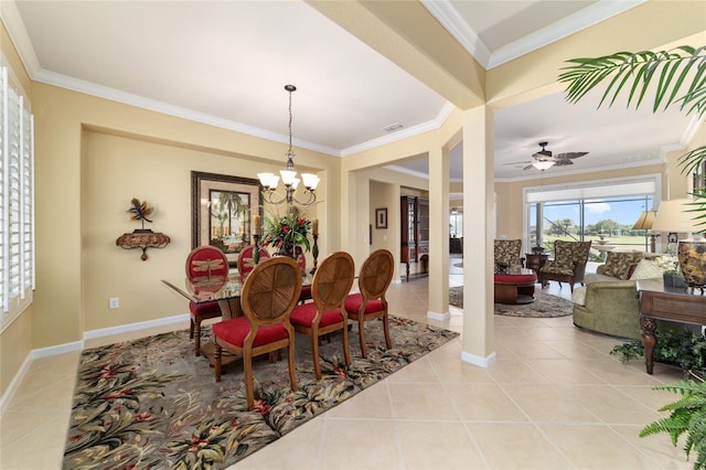 dining room with baseboards, visible vents, light tile patterned floors, and crown molding