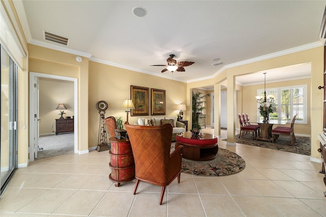 living room featuring visible vents, light tile patterned floors, and crown molding