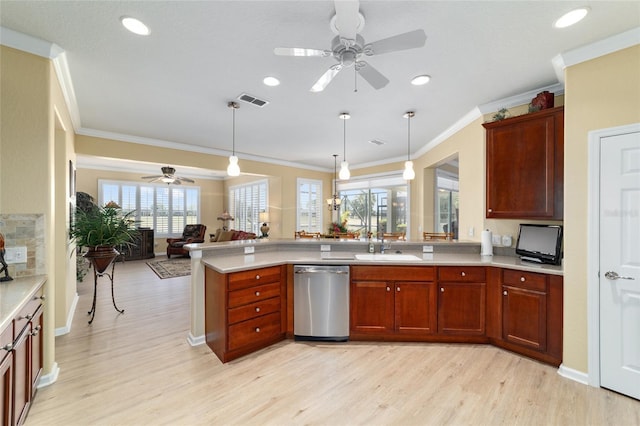 kitchen featuring light countertops, stainless steel dishwasher, a peninsula, open floor plan, and ceiling fan