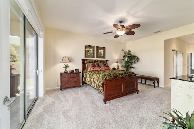 bedroom featuring light carpet, baseboards, visible vents, and a ceiling fan
