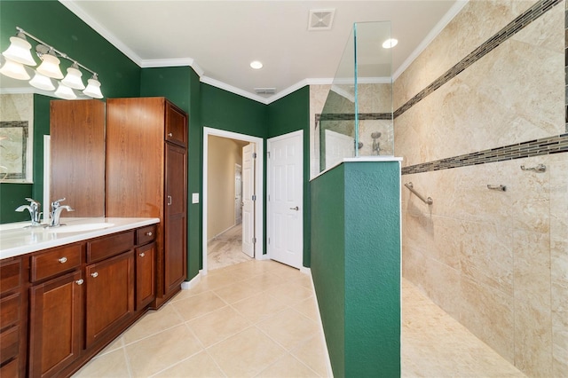 bathroom featuring ornamental molding, visible vents, and a walk in shower