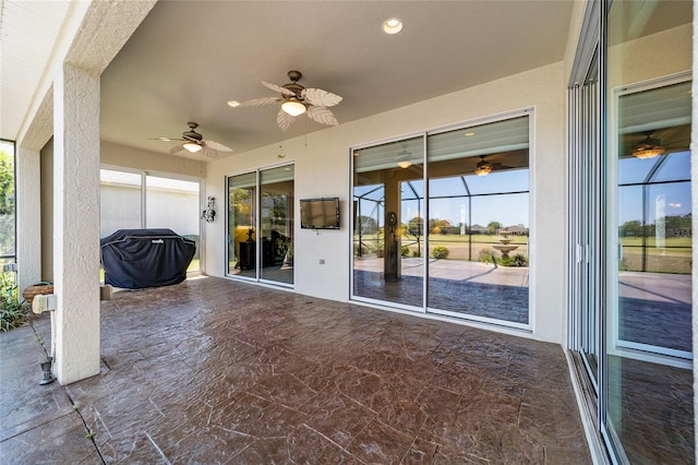view of patio featuring a ceiling fan