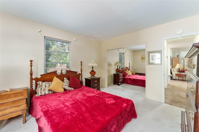 carpeted bedroom with a closet