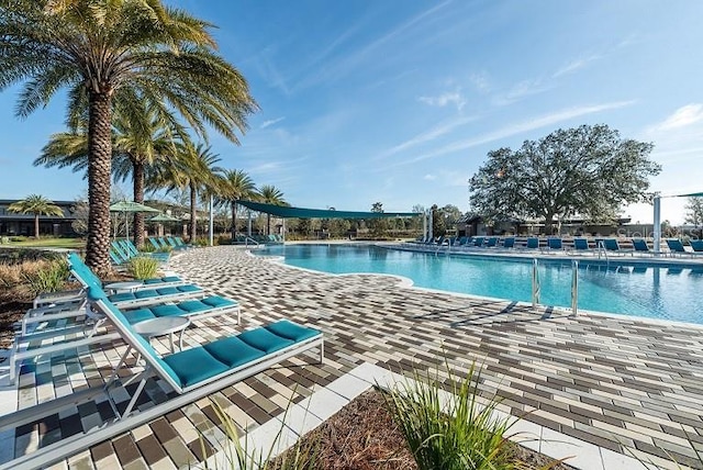 pool with a patio