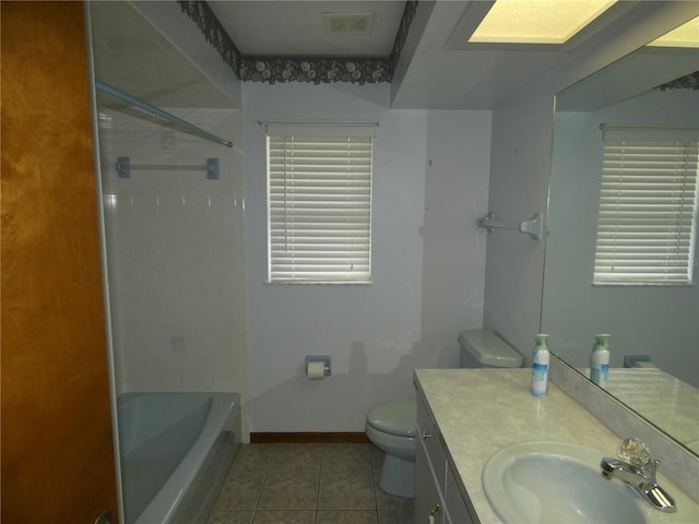 full bathroom featuring vanity, visible vents, toilet, tile patterned floors, and baseboards