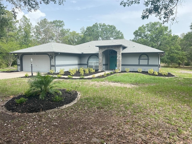 20364 SW 86th Loop, Dunnellon, FL 34431 - view of front facade featuring an attached garage, a front lawn, concrete driveway, and stucco siding