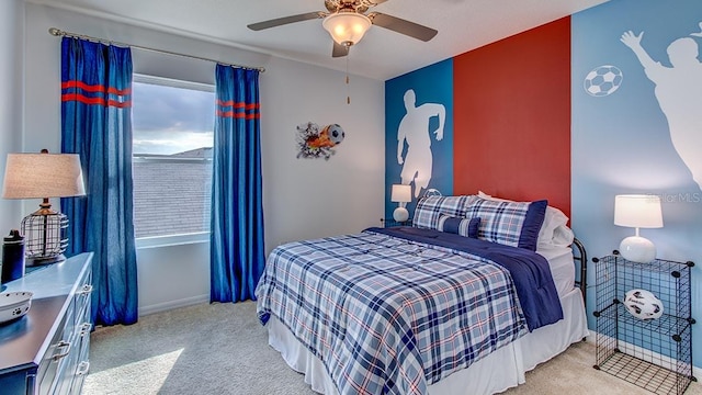 bedroom with carpet flooring, ceiling fan, and baseboards