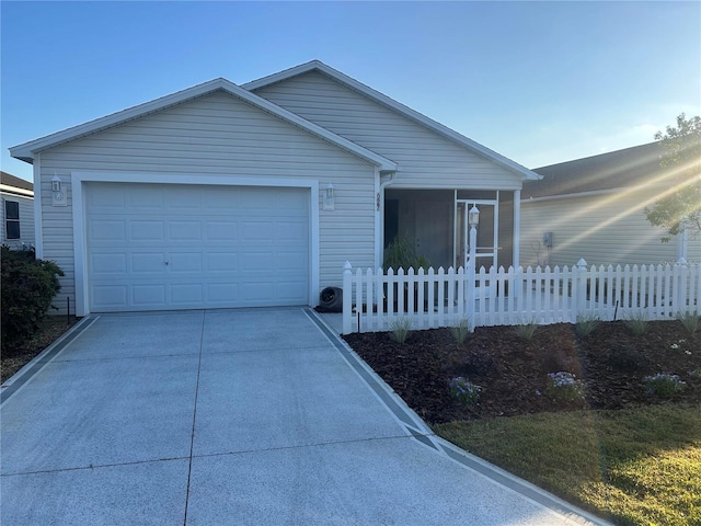 single story home with fence, a sunroom, a garage, and concrete driveway