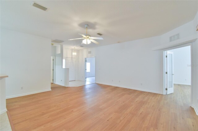 2339 NW 55th Avenue Rd, Ocala, FL 34482 - empty room with ceiling fan, light wood-style flooring, and baseboards