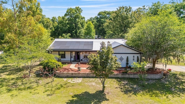 18695 Ne 5th Terrace Road, Citra, FL 32113 - view of front facade with covered porch and solar panels