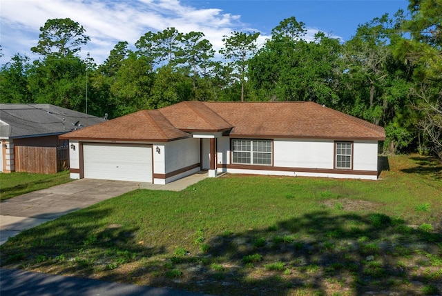 2312 SW 140th Ct, Ocala, FL 34481 - ranch-style house with an attached garage, concrete driveway, and stucco siding