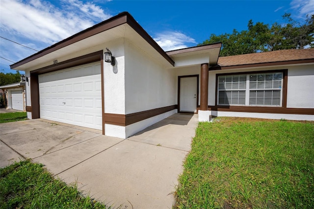 2312 SW 140th Ct, Ocala, FL 34481 - ranch-style house featuring driveway, a garage, a front lawn, and stucco siding