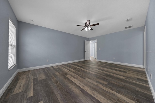 2312 SW 140th Ct, Ocala, FL 34481 - unfurnished room featuring a ceiling fan, dark wood-style floors, baseboards, and a smoke detector