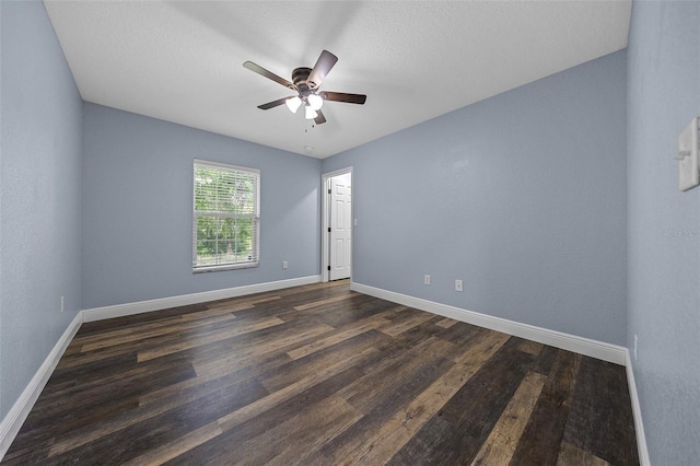 2312 SW 140th Ct, Ocala, FL 34481 - empty room featuring ceiling fan, baseboards, and dark wood-style flooring