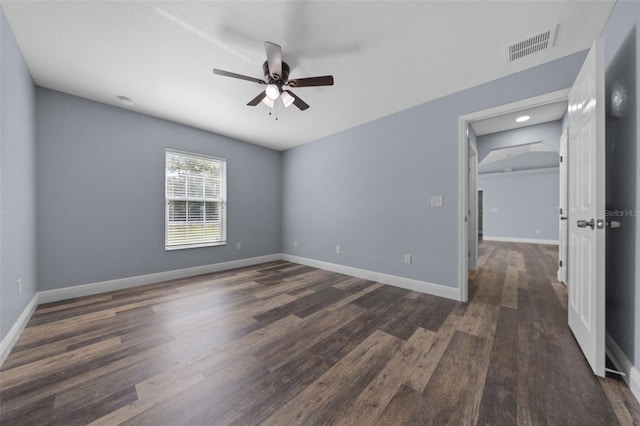 2312 SW 140th Ct, Ocala, FL 34481 - unfurnished room featuring a ceiling fan, dark wood finished floors, and baseboards
