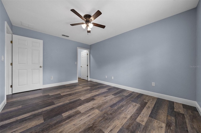 2312 SW 140th Ct, Ocala, FL 34481 - unfurnished bedroom with baseboards, dark wood-style flooring, and a ceiling fan