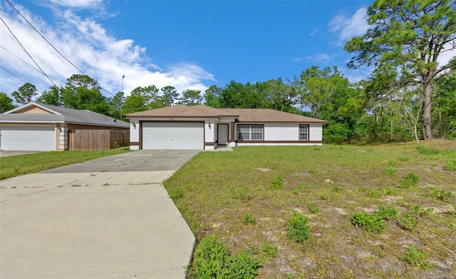 2312 SW 140th Ct, Ocala, FL 34481 - view of front facade featuring an attached garage and driveway