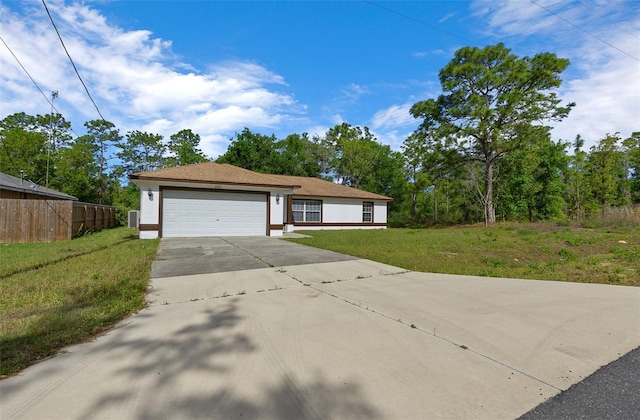 2312 SW 140th Ct, Ocala, FL 34481 - single story home featuring driveway, stucco siding, and a garage