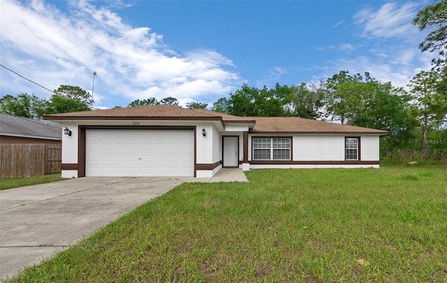 2312 SW 140th Ct, Ocala, FL 34481 - view of front of property featuring stucco siding, a garage, and driveway