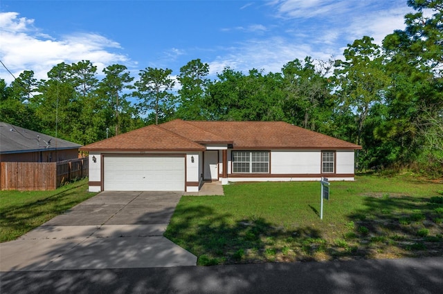 2312 SW 140th Ct, Ocala, FL 34481 - ranch-style house with driveway, an attached garage, and stucco siding