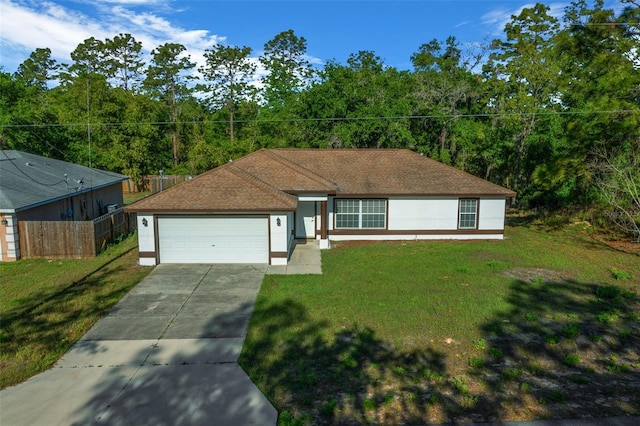 2312 SW 140th Ct, Ocala, FL 34481 - single story home featuring concrete driveway, an attached garage, and a shingled roof