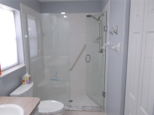 11653 SW 72nd Cir, Ocala, FL 34476 - bathroom with toilet, a shower stall, and vanity
