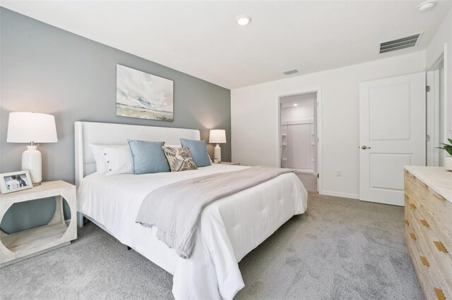 2929 NE 21st Terrace Rd, Ocala, FL 34470 - bedroom with carpet flooring, baseboards, visible vents, and recessed lighting