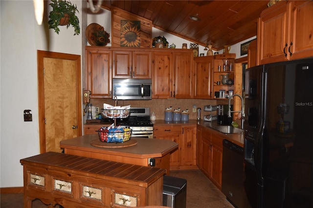 kitchen with open shelves, vaulted ceiling, a sink, tasteful backsplash, and appliances with stainless steel finishes