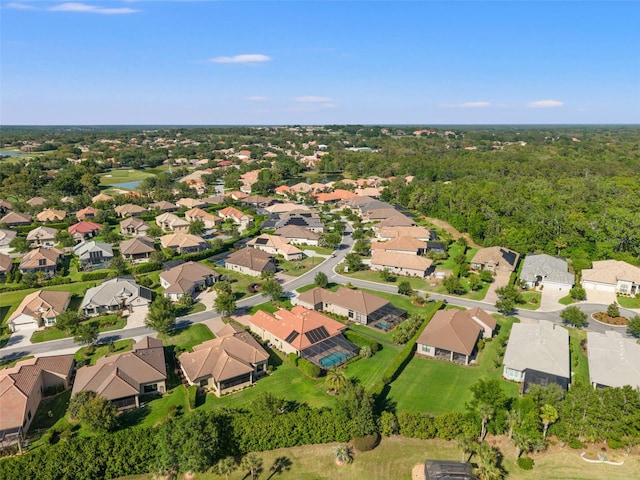 aerial view featuring a water view and a residential view