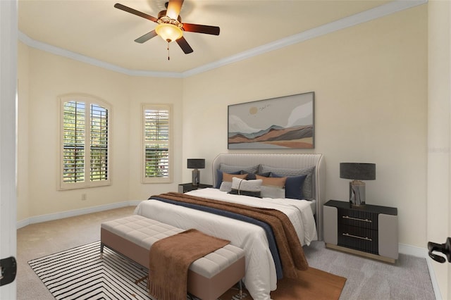 bedroom featuring crown molding, carpet flooring, and baseboards