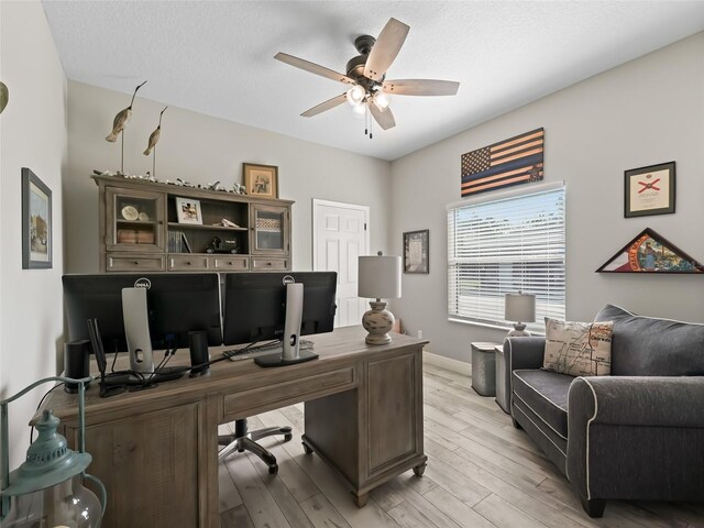 4658 W Hacienda Dr, Beverly Hills, FL 34465 - office space featuring baseboards, a ceiling fan, and light wood-style flooring