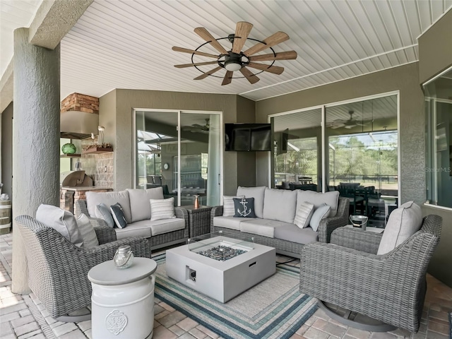 4658 W Hacienda Dr, Beverly Hills, FL 34465 - view of patio featuring an outdoor living space with a fire pit, a ceiling fan, and area for grilling